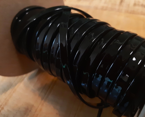 folded patent leather strip